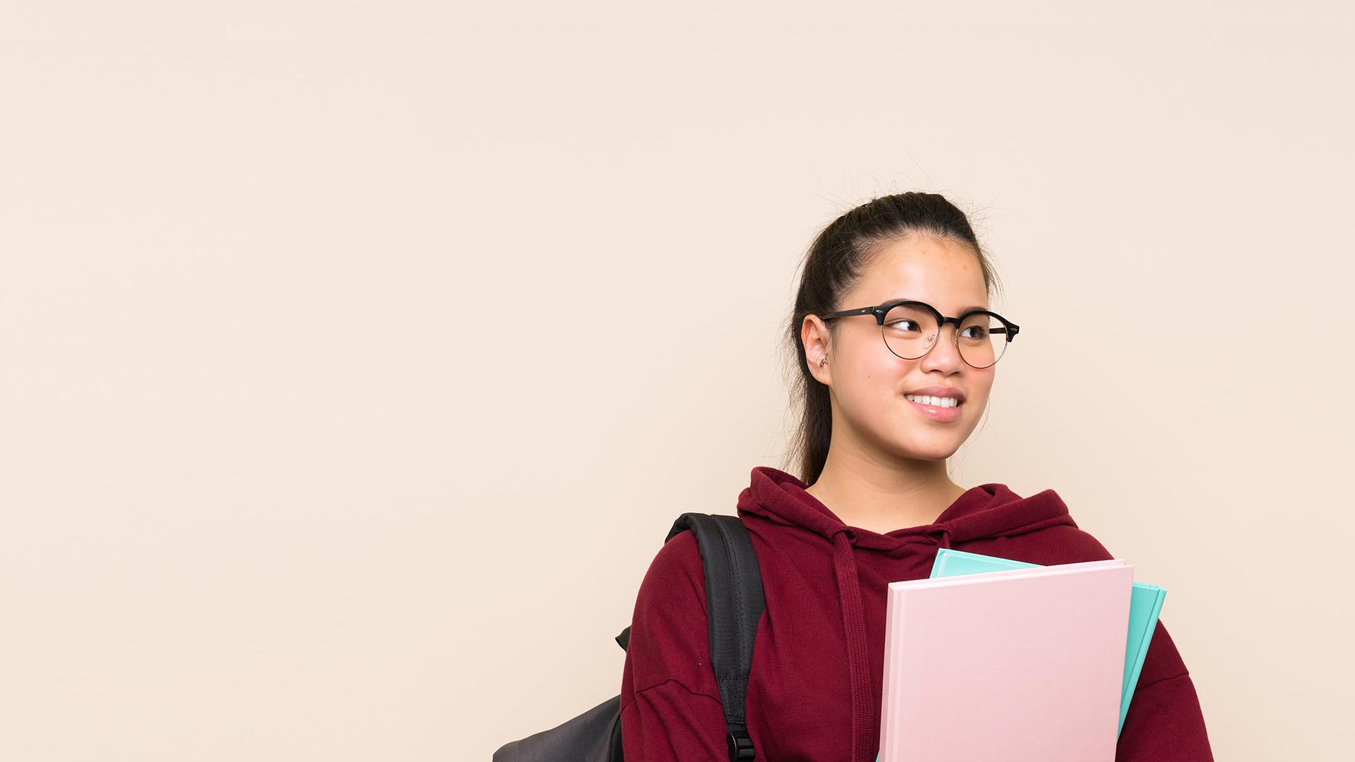 Student Holding Books