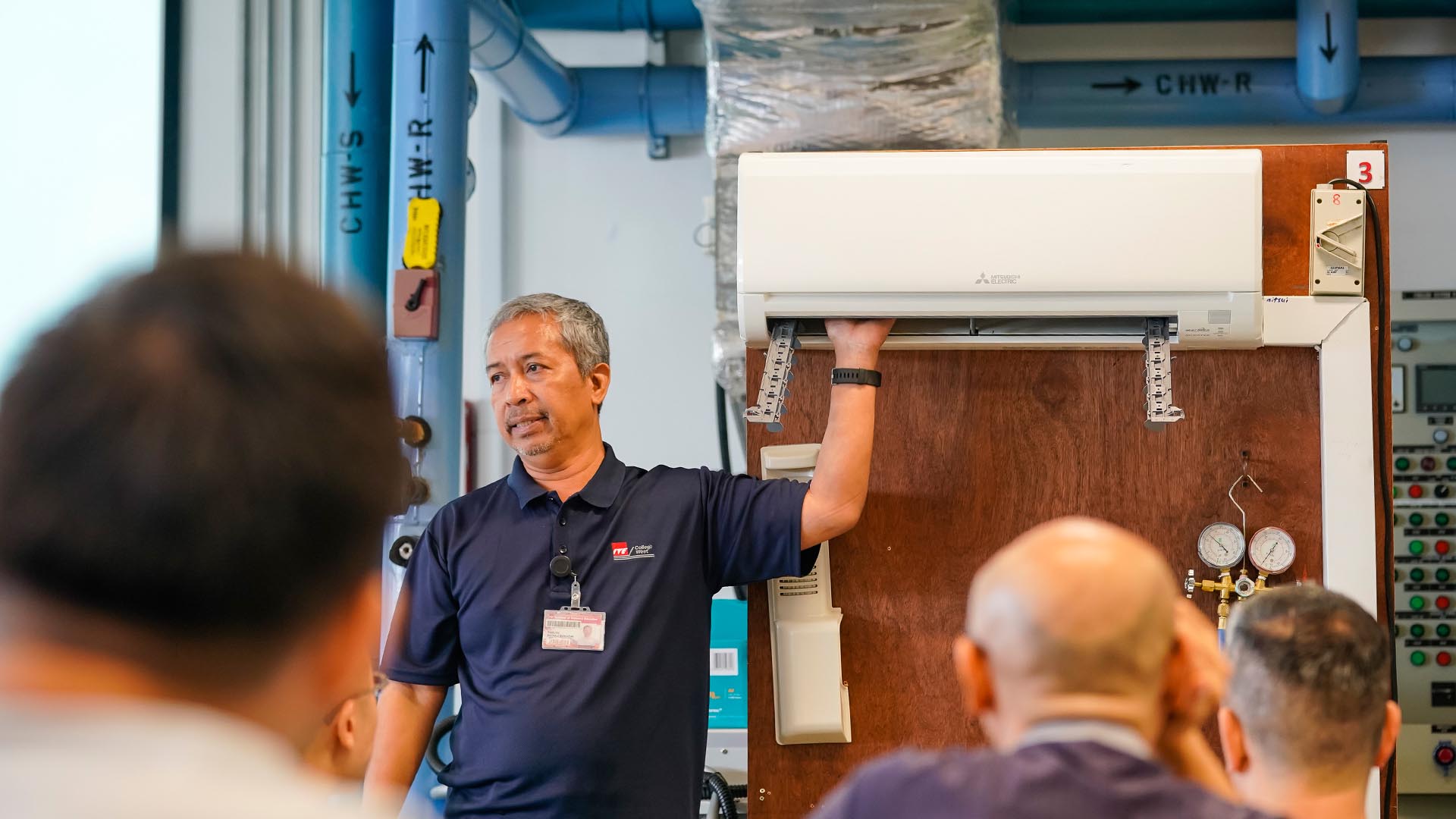 Engineer Holding an Aircon